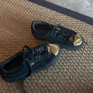 Puma Black Sneakers with Gold Toe Cap